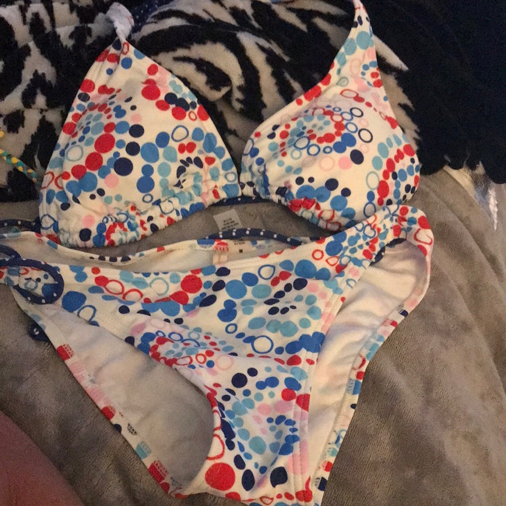 Top is a size large and bottom is a size medium. Like new